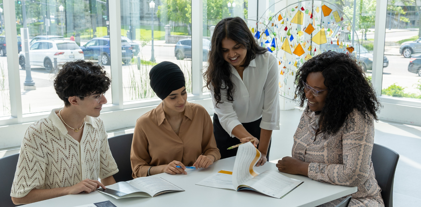 Students speaking to employer